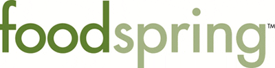 A green and white logo for the company seedspring.